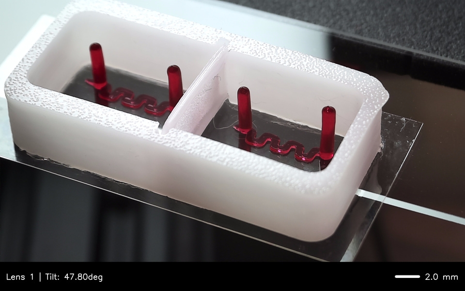 Multi-material microfluidic chip with vascular channels